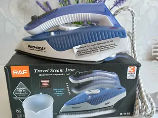 Портативный паровой утюг.